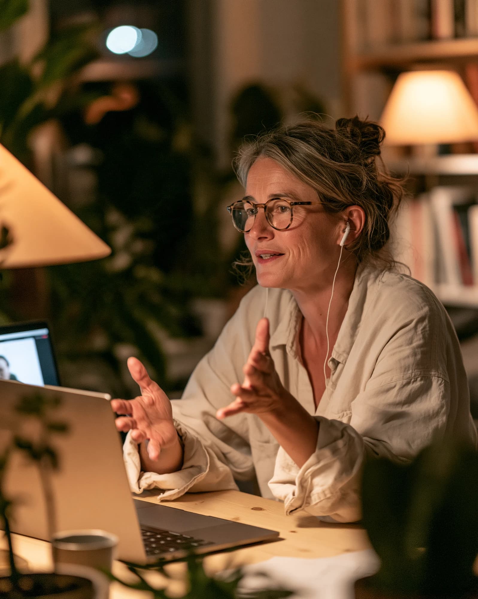 Midwife on a video call at her laptop